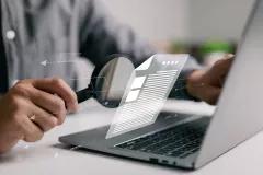Document with a magnifying glass