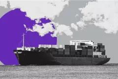 Image showing a cargo ship floating on the sea in front of a purple circle