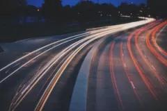 Highway at night with car lights